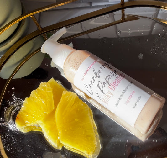 Cranberry & Papaya Milky Cleanser image with pineapple cuttings